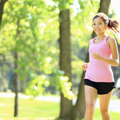 Runner - woman running in park