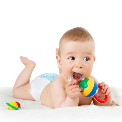 Baby holding a toy