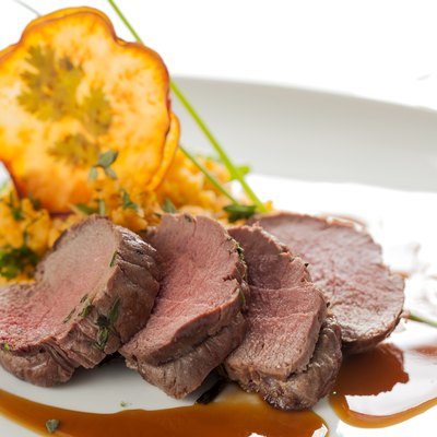 Roasted deer with smashed sweet potatoes and chips
