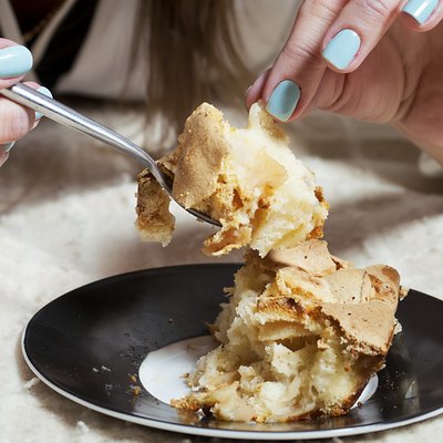 Hands with Spoon and Pie