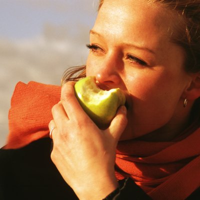 woman eating an apple