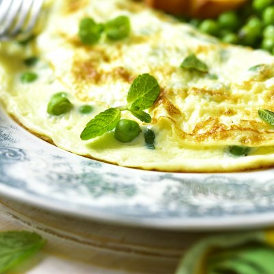 Omelet stuffed with green pea and mint.