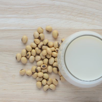 Fresh Soy milk in a glass and soybean seeds
