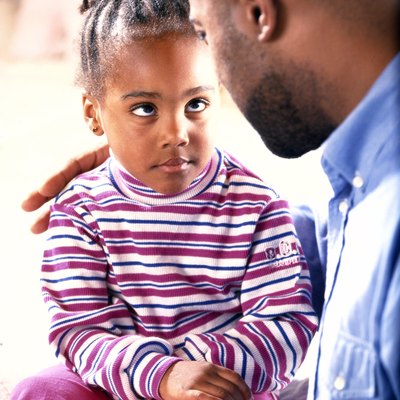 Father talking to daughter