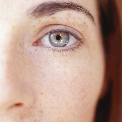 Woman looking at camera, (Close-up)