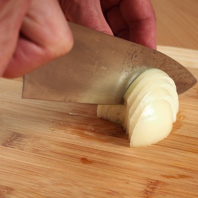 Slicing Onion. Making Stuffing. Preparation Meat Dumplings.