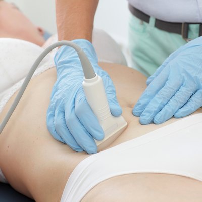 caucasian woman being examined on the ultrasound