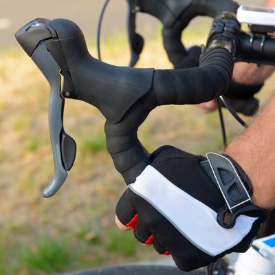 Hands on bicycle's handlebars