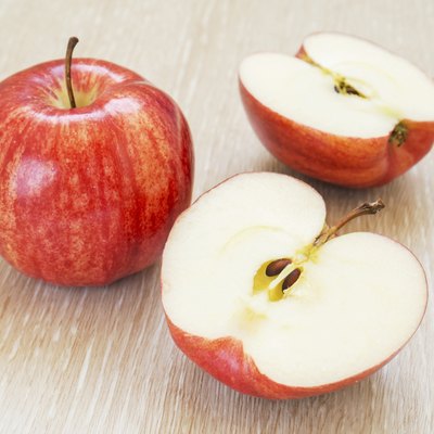 Red apple and half