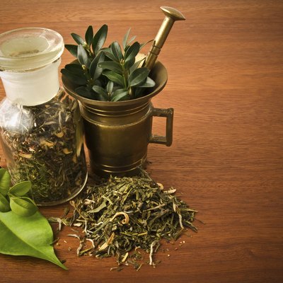 Mortar, pestle and pharmacy bottle.