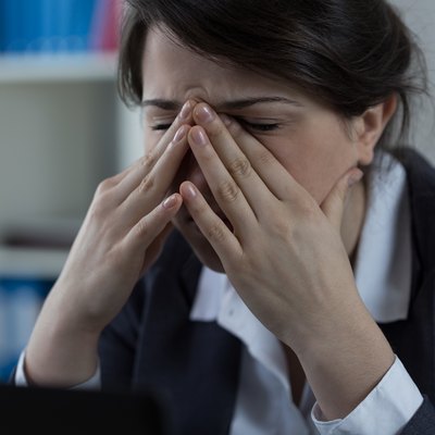 Business worker with sinus pain