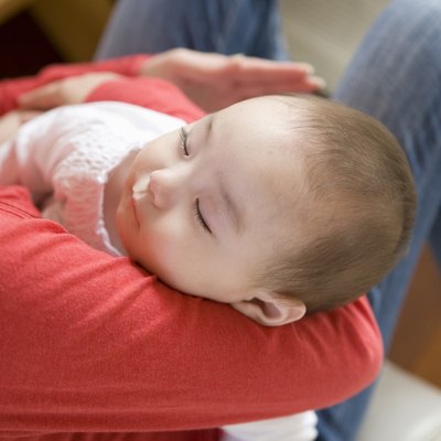 Mother Holding Baby Girl
