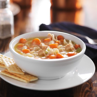chicken noodle soup on wooden table