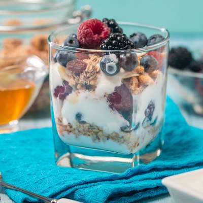 bowl of muesli and yogurt with fresh berries