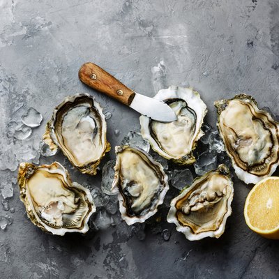 Opened Oysters Fines de Claire and lemon
