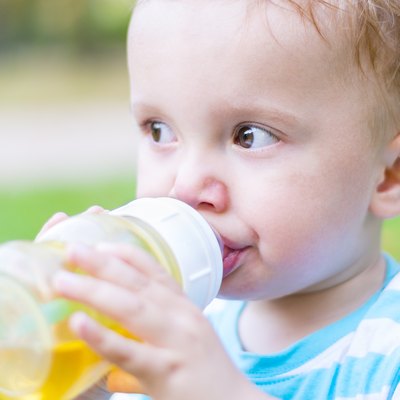 Little boy drinking his beverage