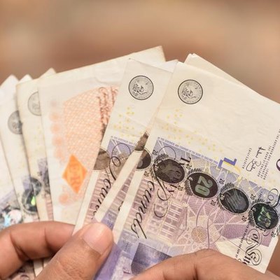 A handful of English Pounds.