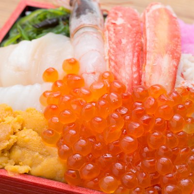 Bowl of rice topped with sashimi