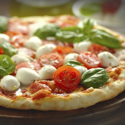 Freshly baked tomato and mozzarella pizza