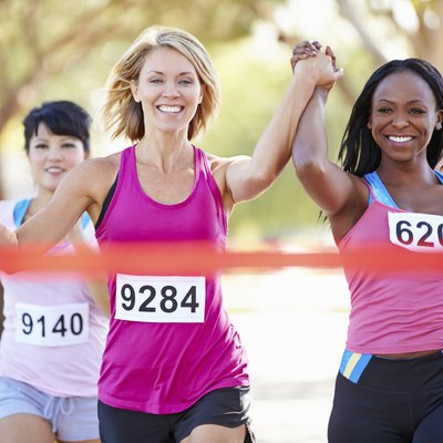 Two Female Runners Finishing Race Together