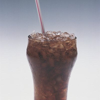 Glass of soda with straw