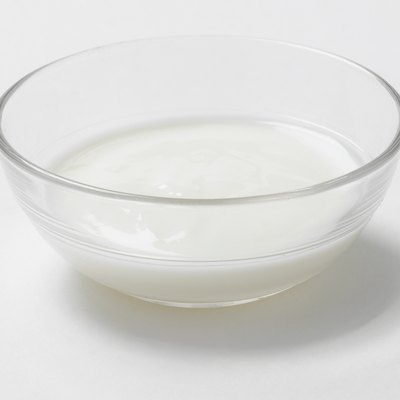 Buttermilk in a glass bowl, studio shot