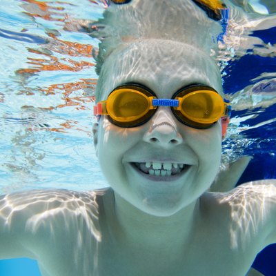 Smiling boy underwater
