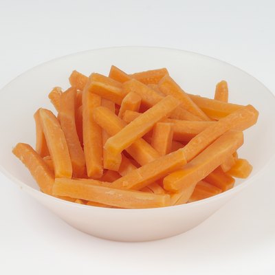 Bowl of carrots, studio shot