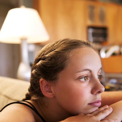 Teenage girl thinking