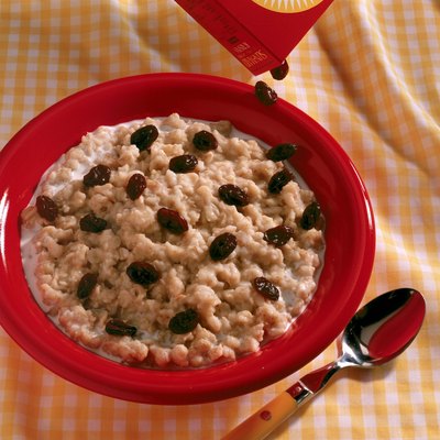 Raisins pouring over oatmeal