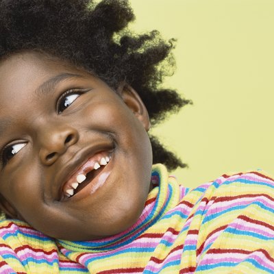 Close-Up Portrait of a Young Girl With Gappy Teeth
