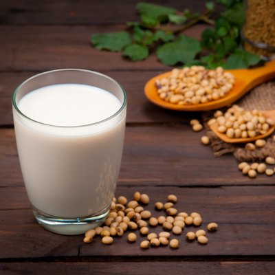 Soy milk with beans on wood
