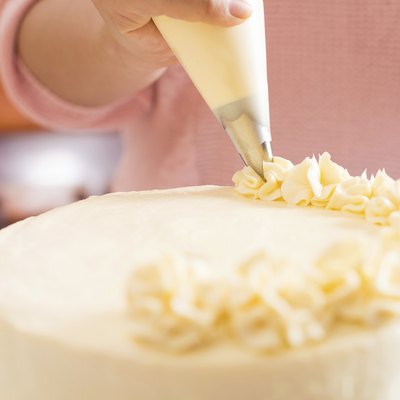 Frosting the cake