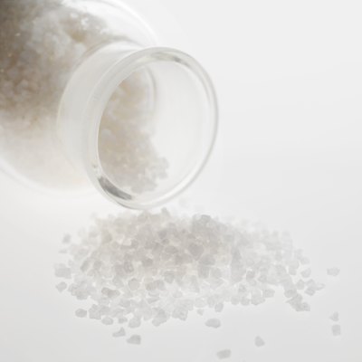 Bath salts spilling from jar