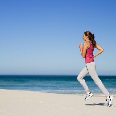 Woman running on beach