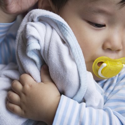 Baby Holding Blanket