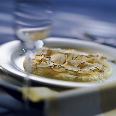Polenta with cheese on plate