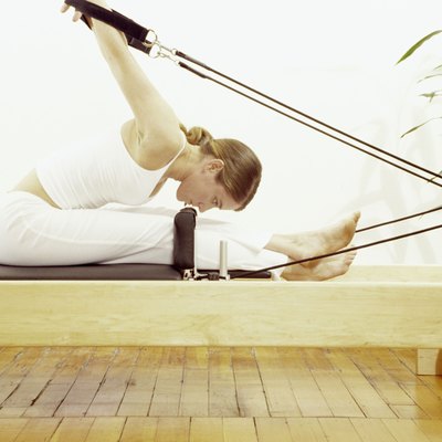 Woman doing Pilates exercises