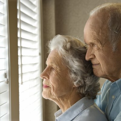 Couple waiting by window