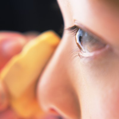 Closed Up Image of a Woman Applying Some Foundation, Differential Focus