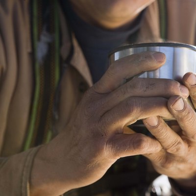 Man holding coffee cup