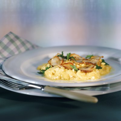 Scrambled eggs with edible mushroom in plate