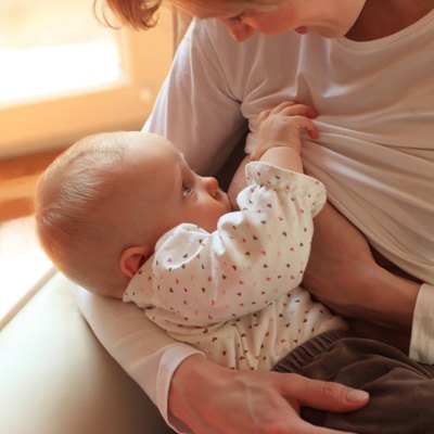mother breastfeeding baby 5