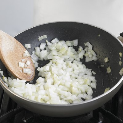 Frying onions, close up
