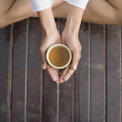 Woman's hands holding tea