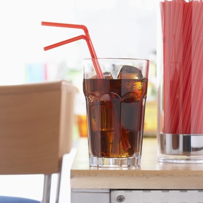 Drink and straw in glass