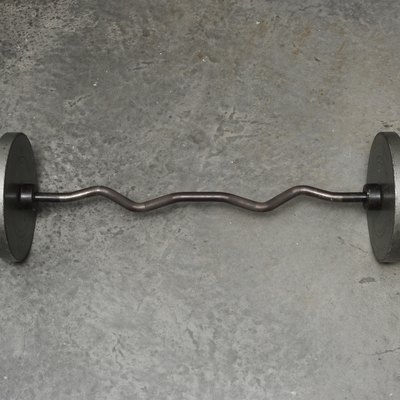 Barbell on concrete floor, overhead view