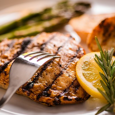 Chicken breast dinner on plate