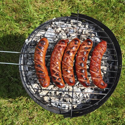 Grilling Sausages on barbecue grill