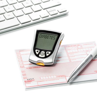 Glucose meter and recipe on the doctors desk